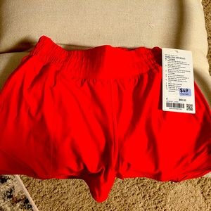 Brand new, never worn LuluLemon Hottie Hot shorts 4" lined.  Size 4